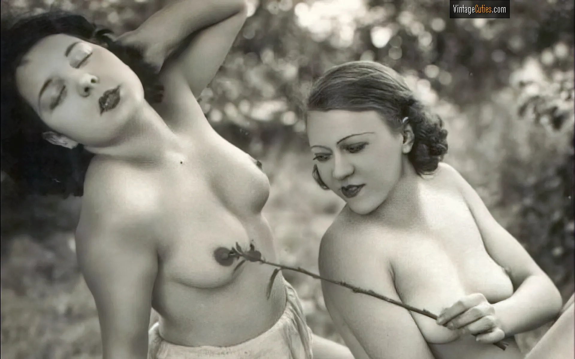 Two vintage teens enjoy touching each other's tits
