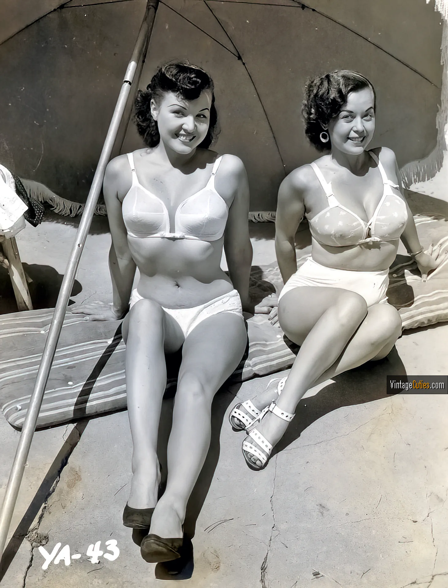 Seductive babes pose in their vintage bikinis on the beach