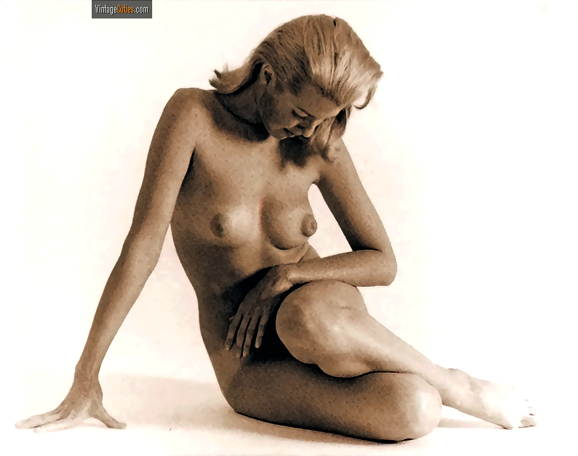 Blonde Juliet Anderson aka Aunt Peg shows her sore rosy nipples