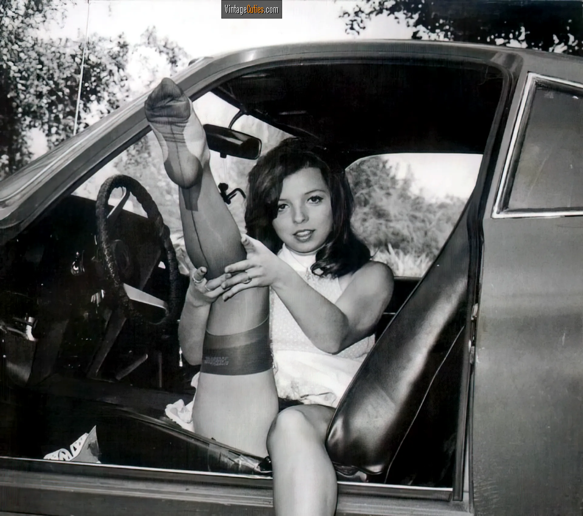 Rene Bond shows off her beautiful leg in a stocking