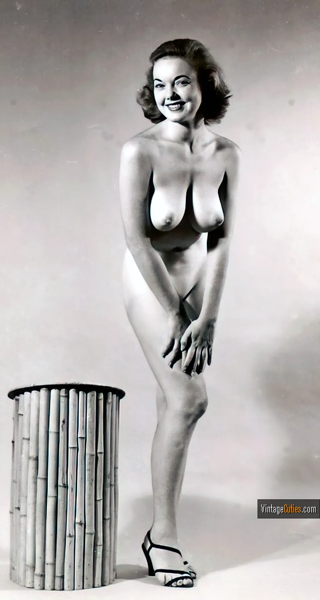 Judy O'Day tries to cover her pussy while exposing titties