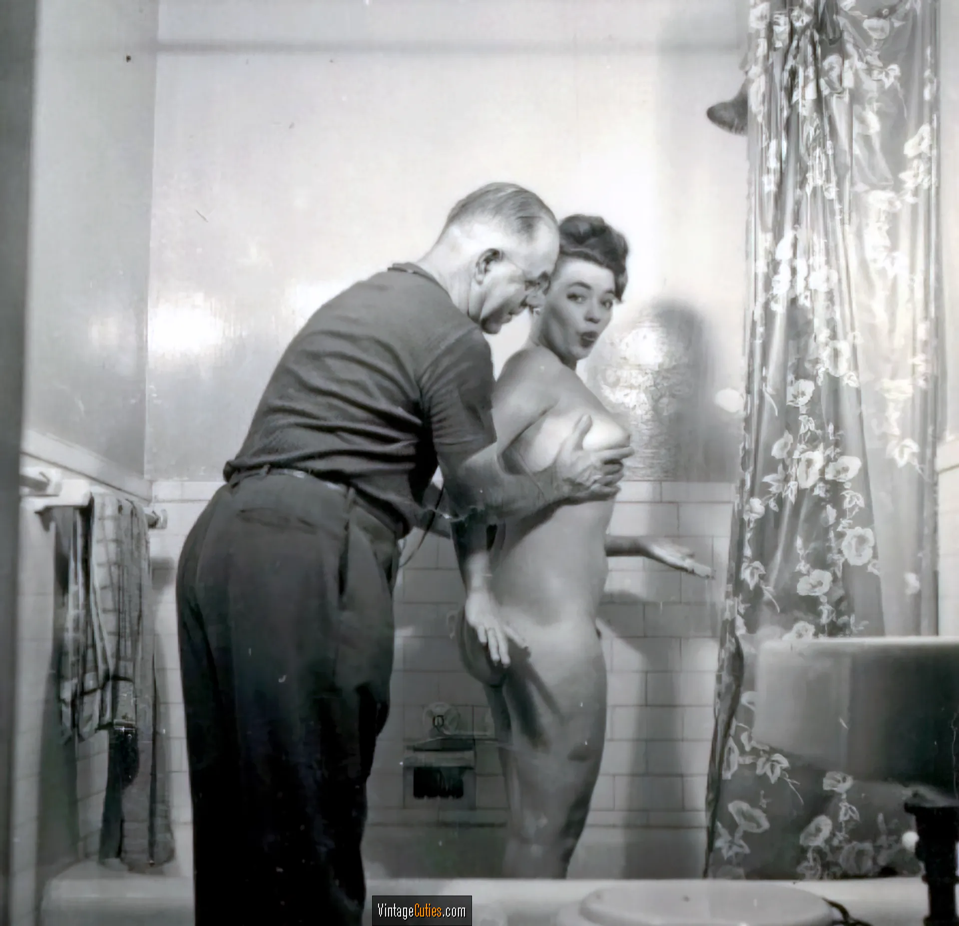 June King has her soft boobs squeezed by a guy in a bathtub