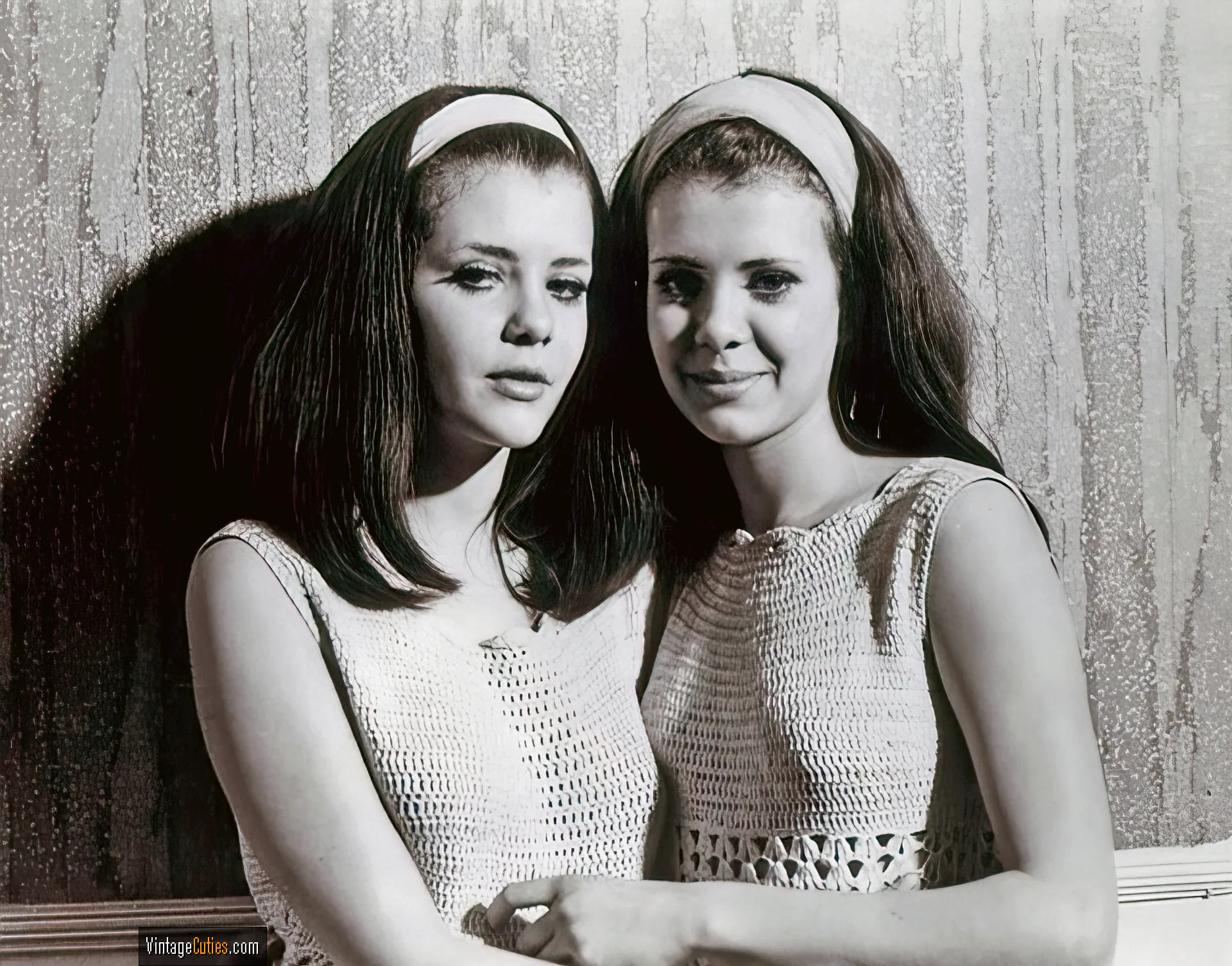 Sweet retro Collinson Twins softly hugging each other